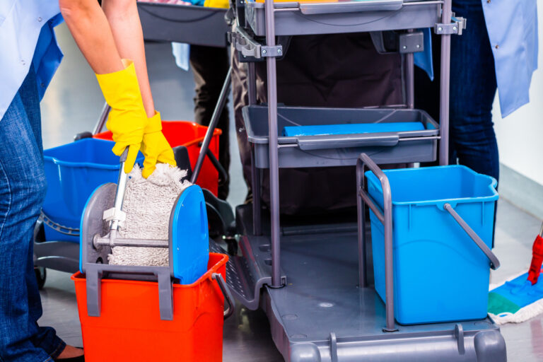 cleaning ladies mopping floor